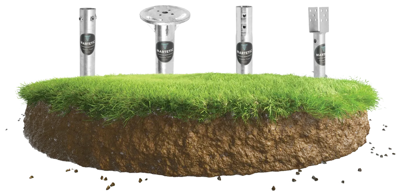 The complete Martetic foundation screw range: the four head types (G, M, V and C), with the MARTETIC label, installed in the ground